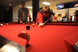 students playing pool opening weekend