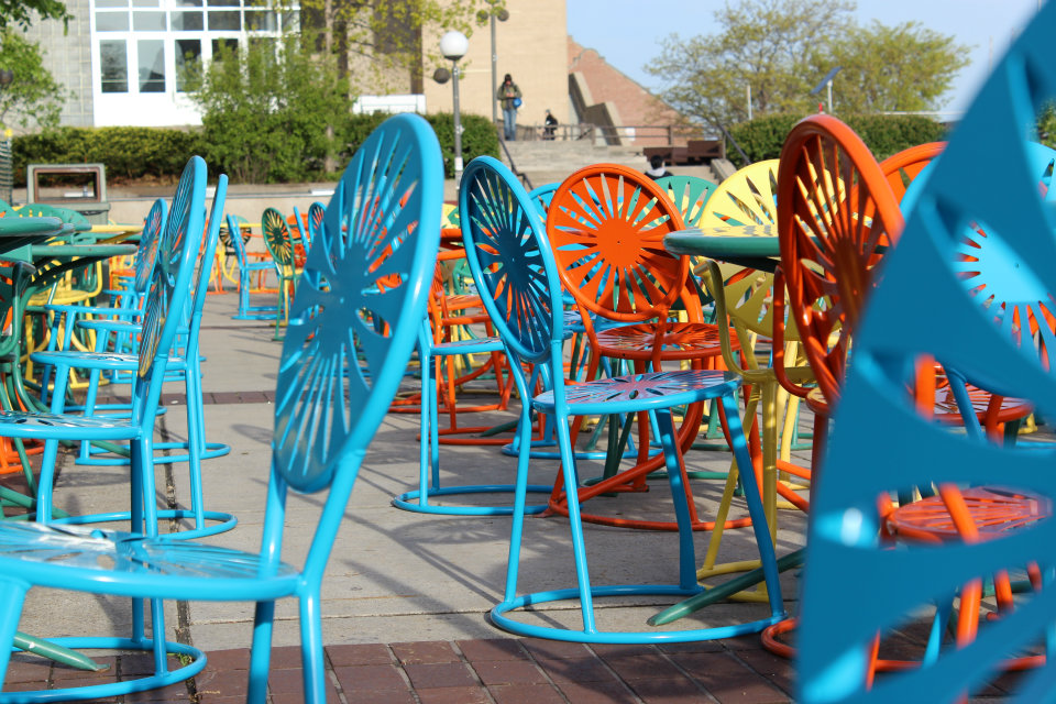 UW Madison Sun print chair at Union Terrace with lakefront background