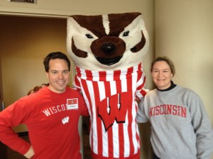 Bill Niemeyer and his wife Allison Duncan are all smiles with Bucky at Union South before a Badger football game. 