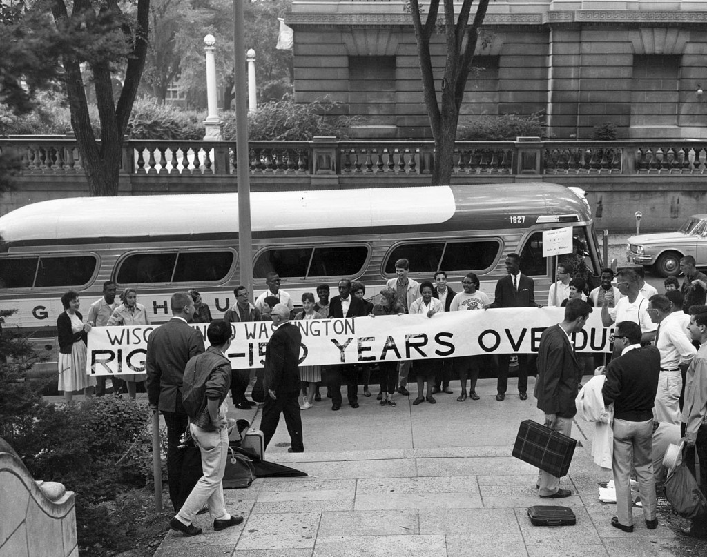 Students gather beside a bus outside Memorial Union that will take them to the March on Washington in 1963. Stay tuned for a Terrace Views article celebrating Black History Month at the Wisconsin Union. Photo courtesy of University of Wisconsin Digital Collections 