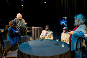 Blind Boys of Alabama at a table