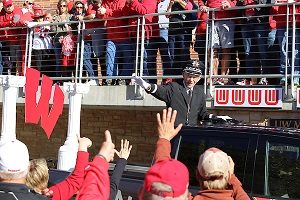 Man waving at Badger Bash