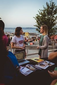 WUD students speaking with interested students