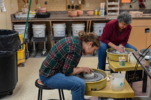 Artists sculpt over a hundred bowls for the upcoming Habitat for Humanity Souper Bowl XXVII fundraiser.