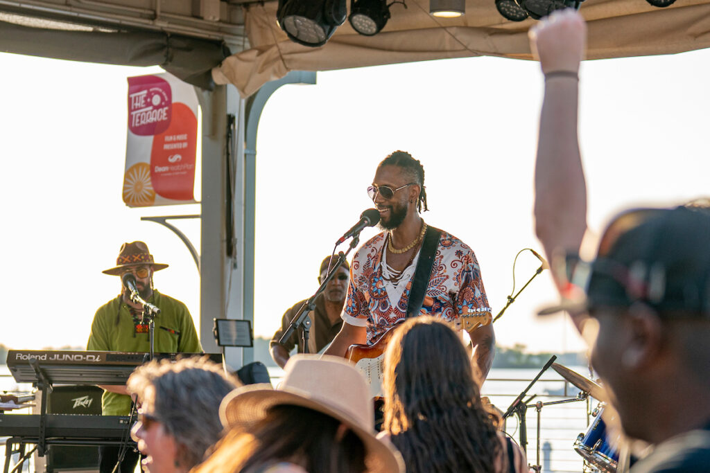 Performers on the UW Credit Union stage on the Terrace