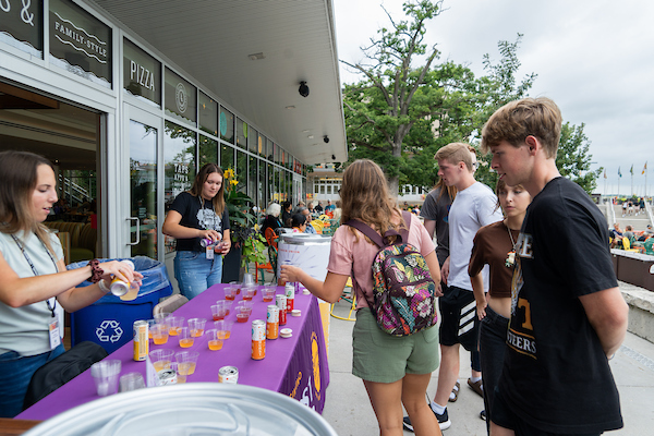 ashley alloway serving beverage samples at the terrace